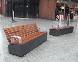 Dark grey polished benches.