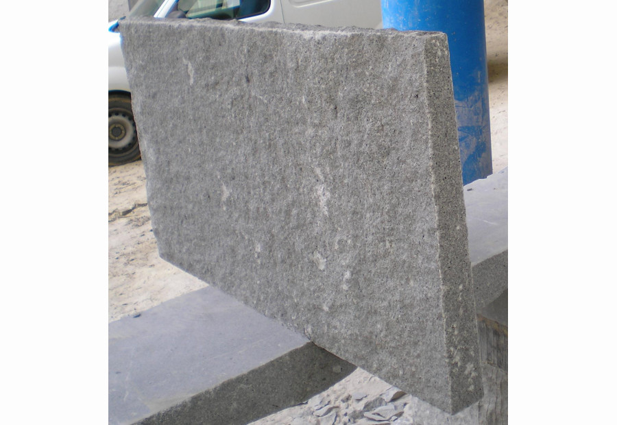 Fire hearth in natural grey granite